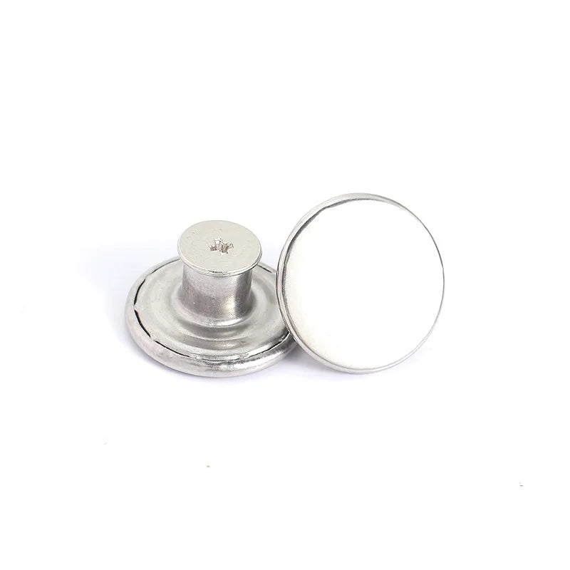 A round metal button with a flat top and a cylindrical post, used for denim and clothing.