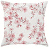 A decorative pillow cover featuring a watercolor pattern of pink cherry blossoms on a white background.