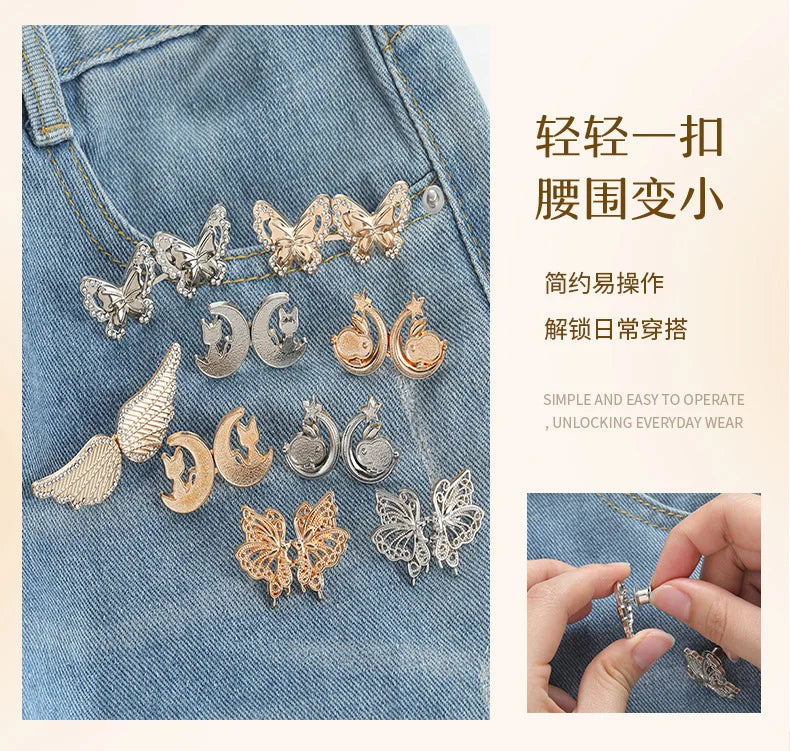 Silver and gold butterfly buttons used to tighten the waist of denim jeans