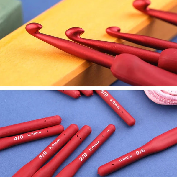 A collection of red ergonomic crochet hooks in various sizes and shapes displayed on a blue surface.