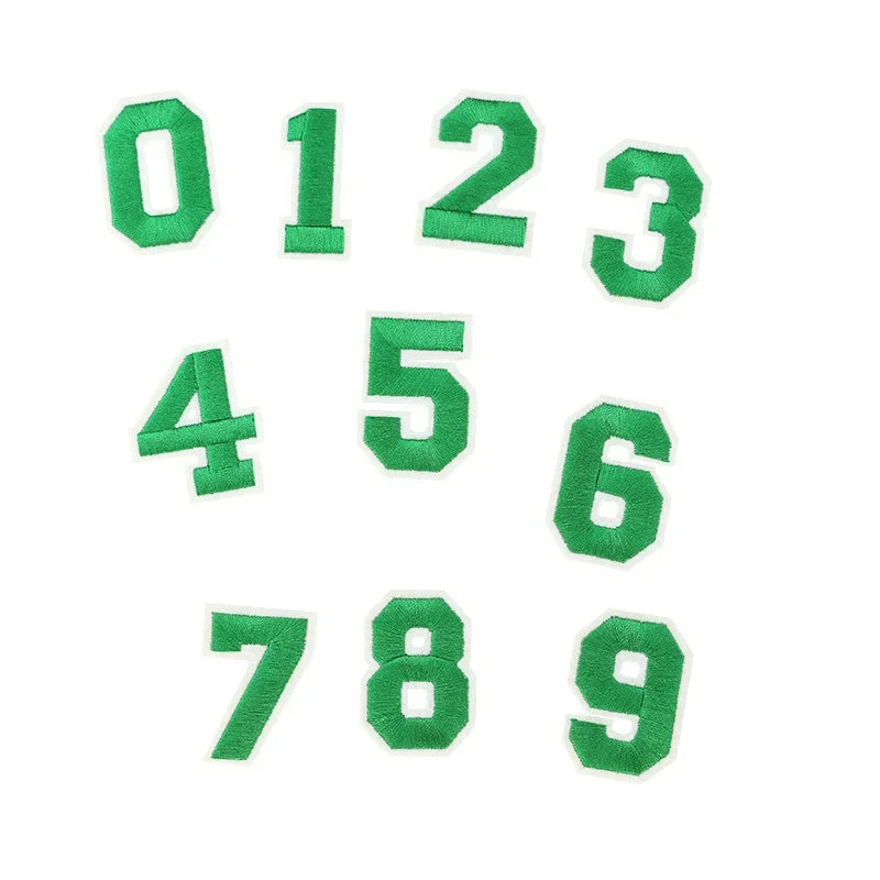 A set of green customizable number patches from zero to nine arranged in a row.