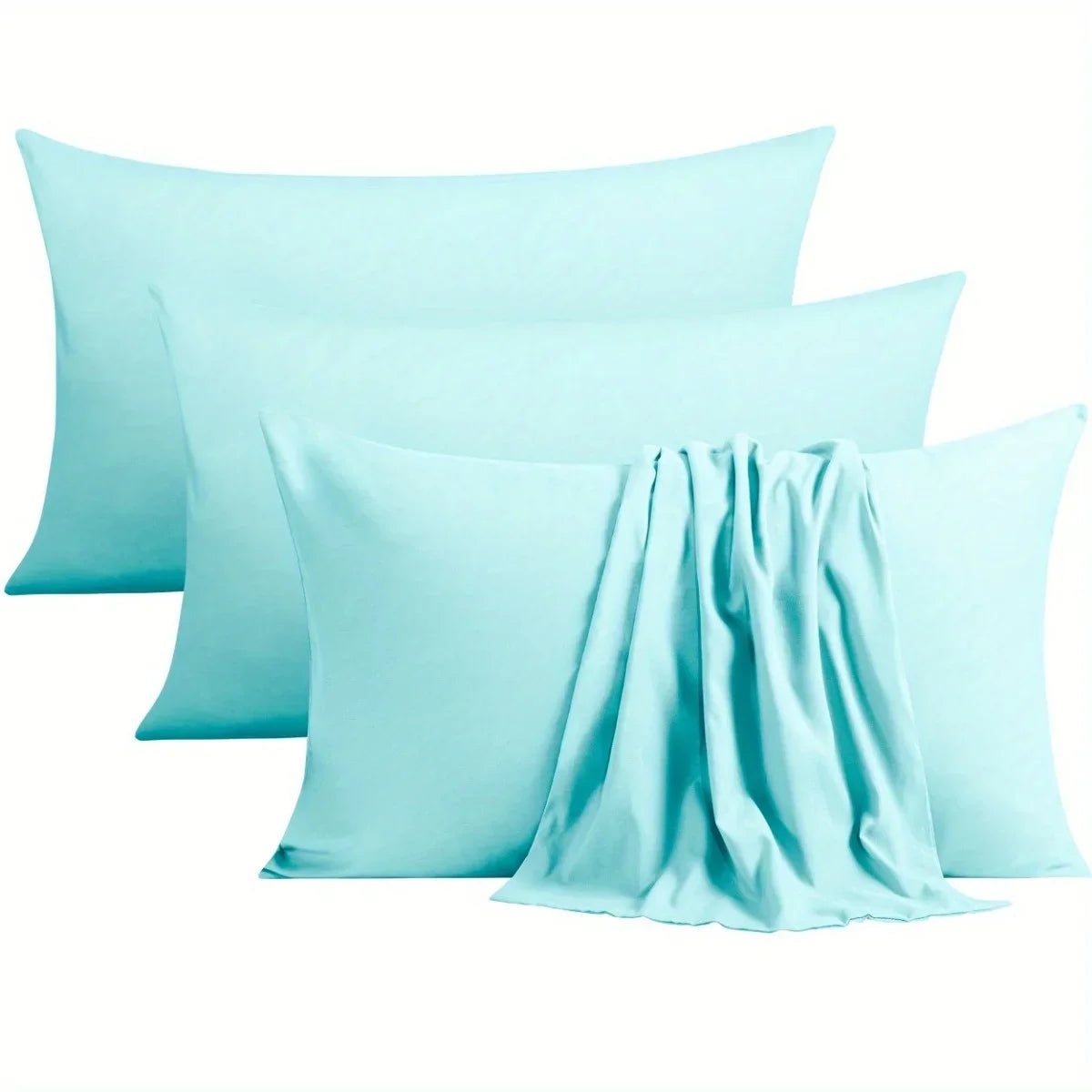 A set of four light aqua microfiber pillow covers stacked together.