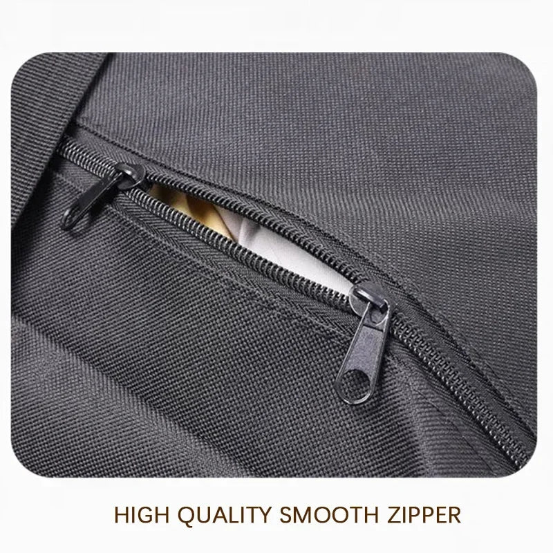 Close-up of a dark gray durable Oxford cloth storage bag showing a smooth zipper detail.