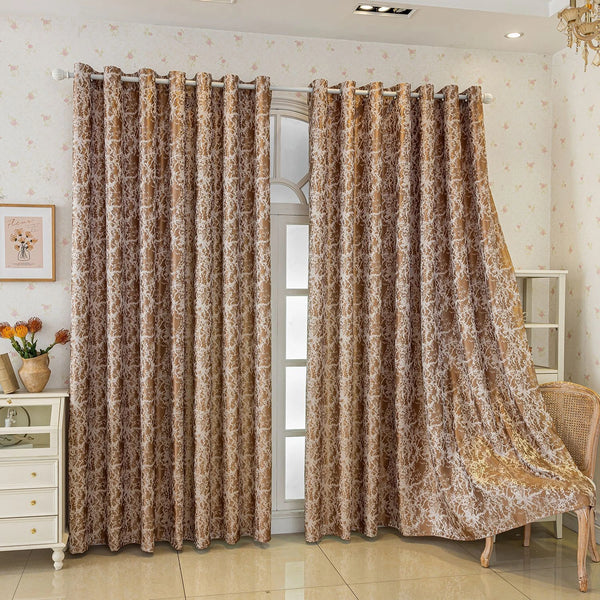 Floor-length brown tree bark pattern blackout curtains hanging in a doorway.