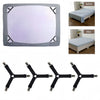 Set of adjustable black triangle clips used to secure a bed sheet