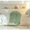 A leaf floral duvet cover set displayed on a bed with natural light and white modern furniture.