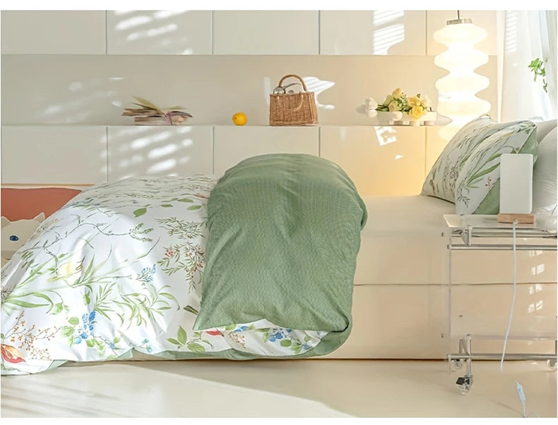 A leaf floral duvet cover set displayed on a bed with natural light and white modern furniture.