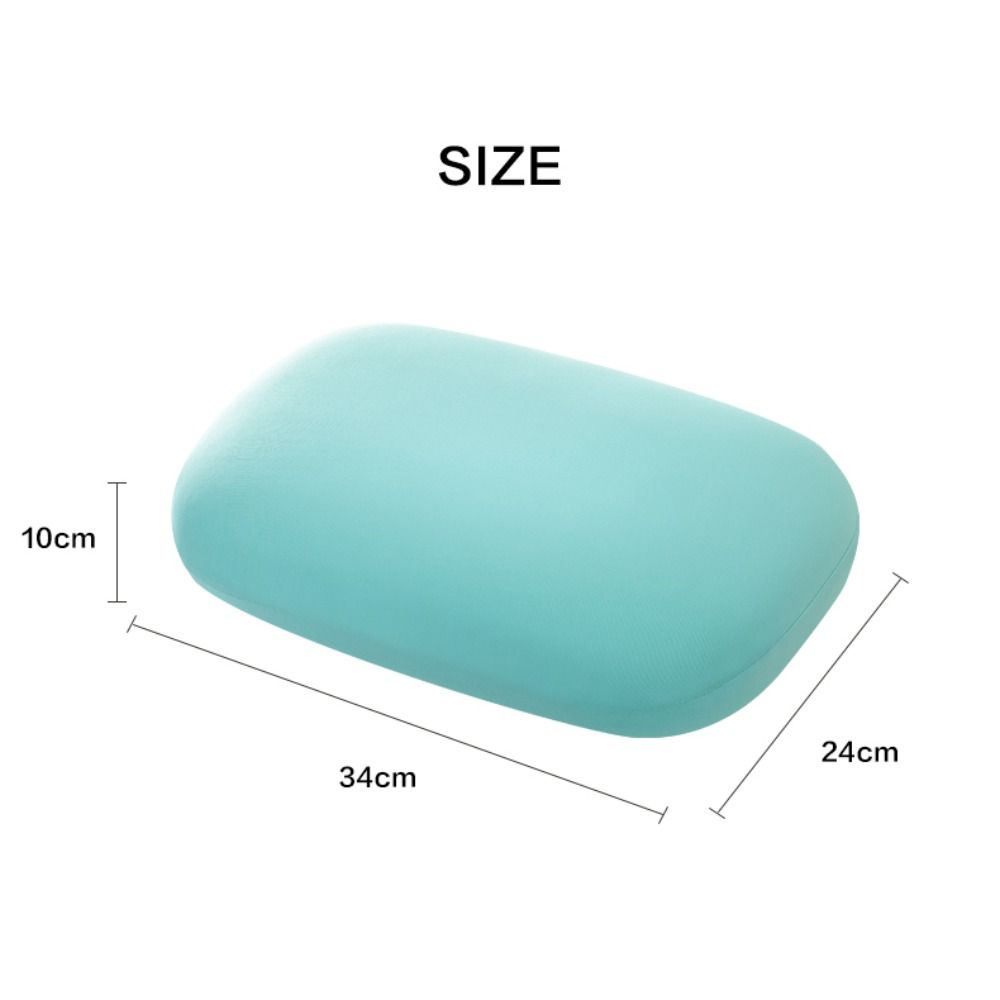 Light blue ergonomic memory foam neck pillow with dimensions marked.